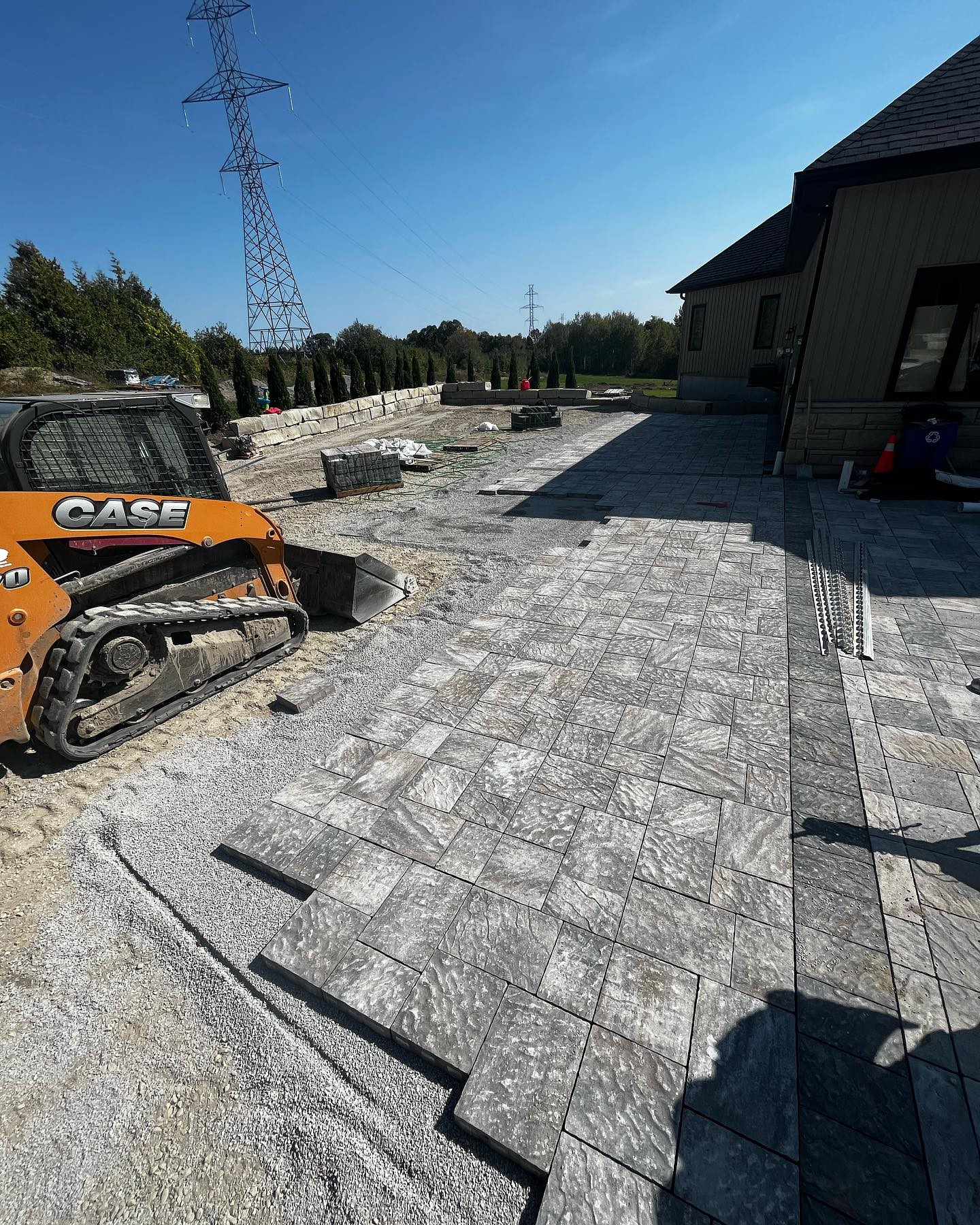 Interlock walkway and patio installation in progress